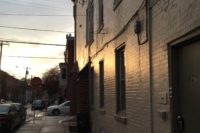 Picture of a city street at sunset,.
