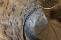 A spiral staircase seen from above.